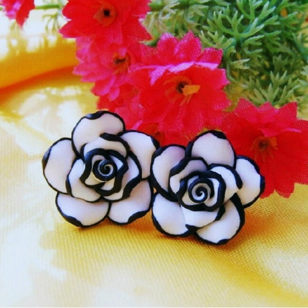 White and Black Pierced Earrings.